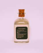 The Deep Soil Cold-Pressed Coconut Oil bottle back view showing Product Ingredients label on white background